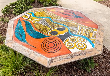 One of the five Aboriginal hexagonal artworks that make up this work 