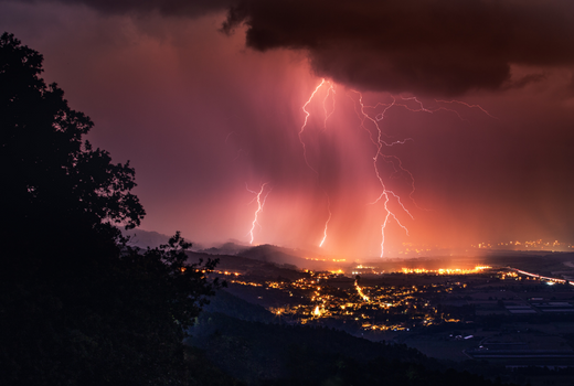 Lightning strikes over city 