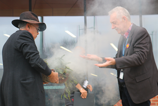 Aboriginal Elder Uncle Shane Charles with Councillor Bruce Lancashire during a smoking ceremony