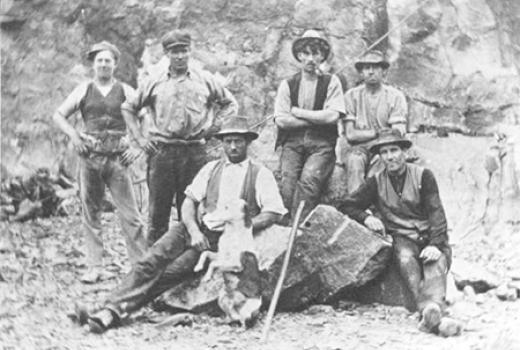 Old photo of men working in the quarry lapproximately early 1900s