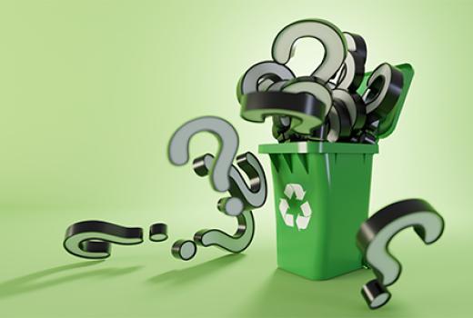 Recycling bin overflowing with large 3D question marks