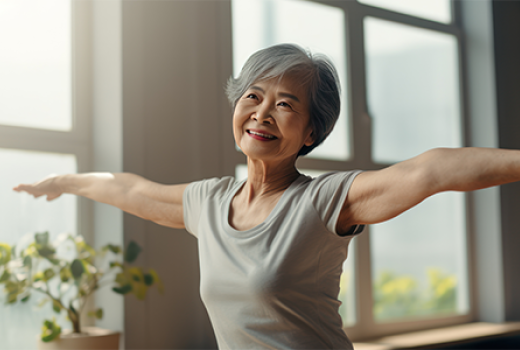 Older asian woman exercising at home